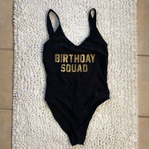 Black One piece Swim suit.